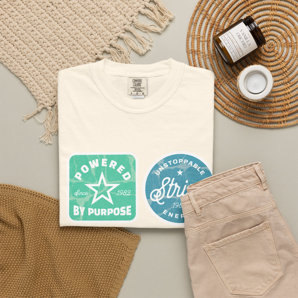 Motivational Badge Graphic Textured T-Shirt — "Powered by Purpose, Strive, Journey, Freedom"