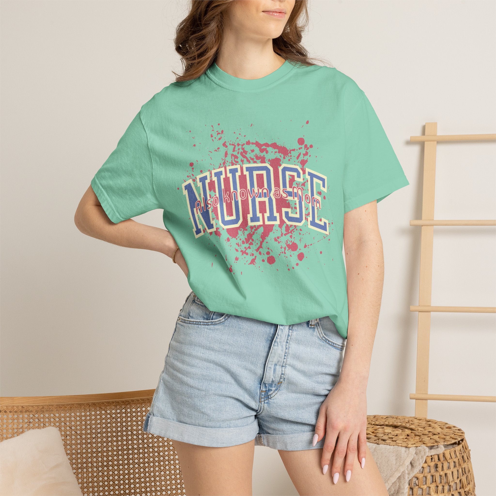 Nurse Also Known As Mom Textured T‑Shirt — Retro Collegiate Text with Paint Splatter