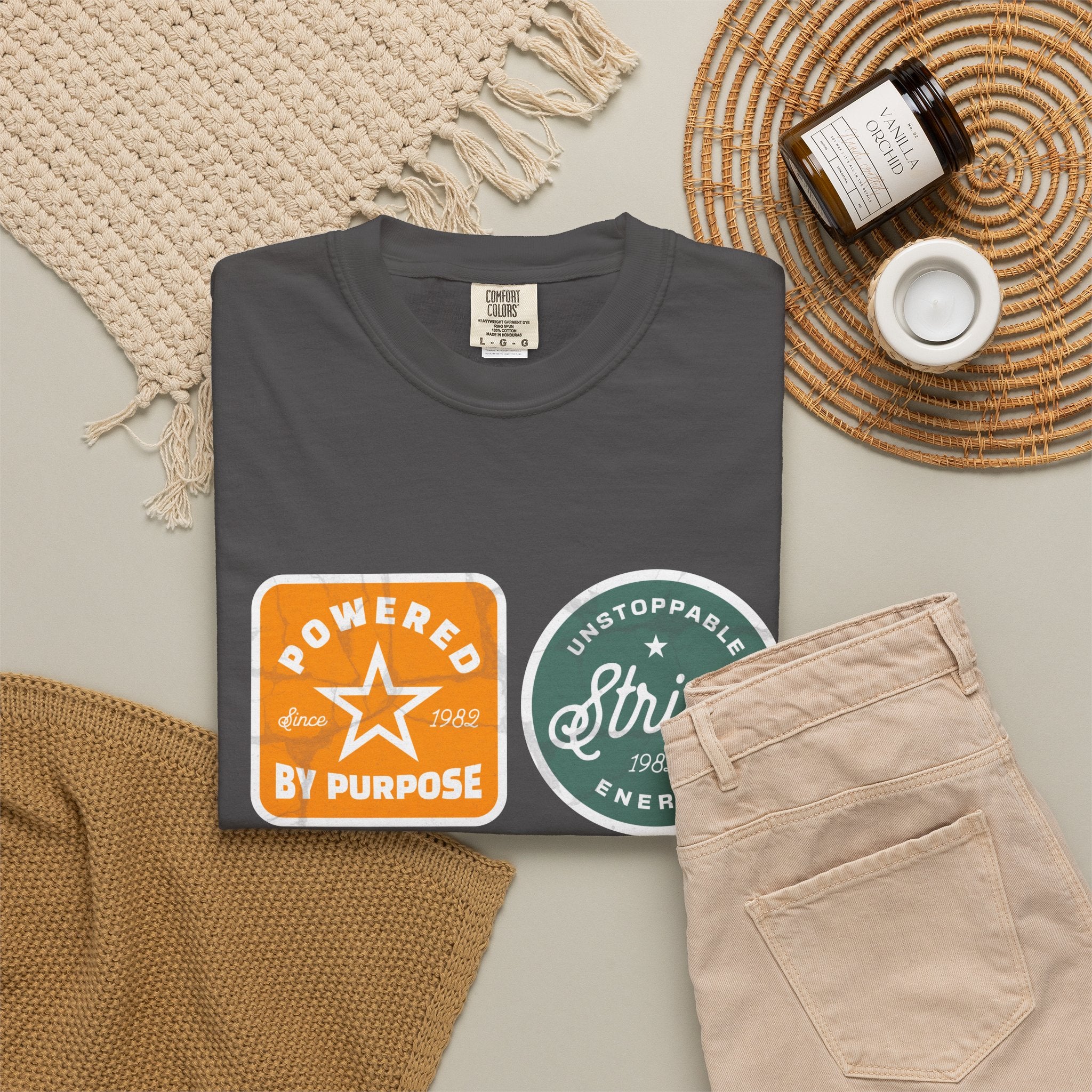 Motivational Badge T-Shirt — "Powered by Purpose / Strive / Journey / Freedom"