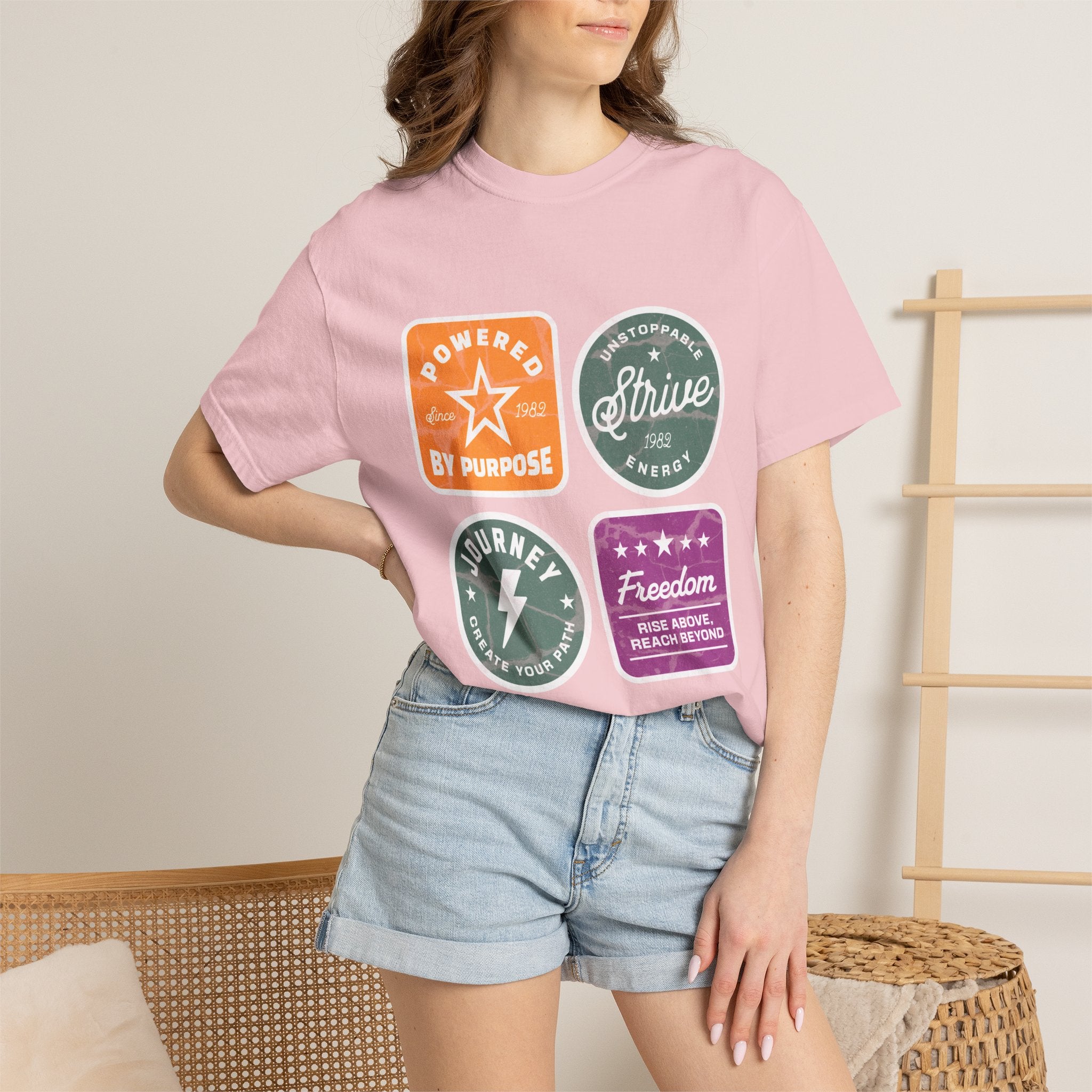 Motivational Badge T-Shirt — "Powered by Purpose / Strive / Journey / Freedom"