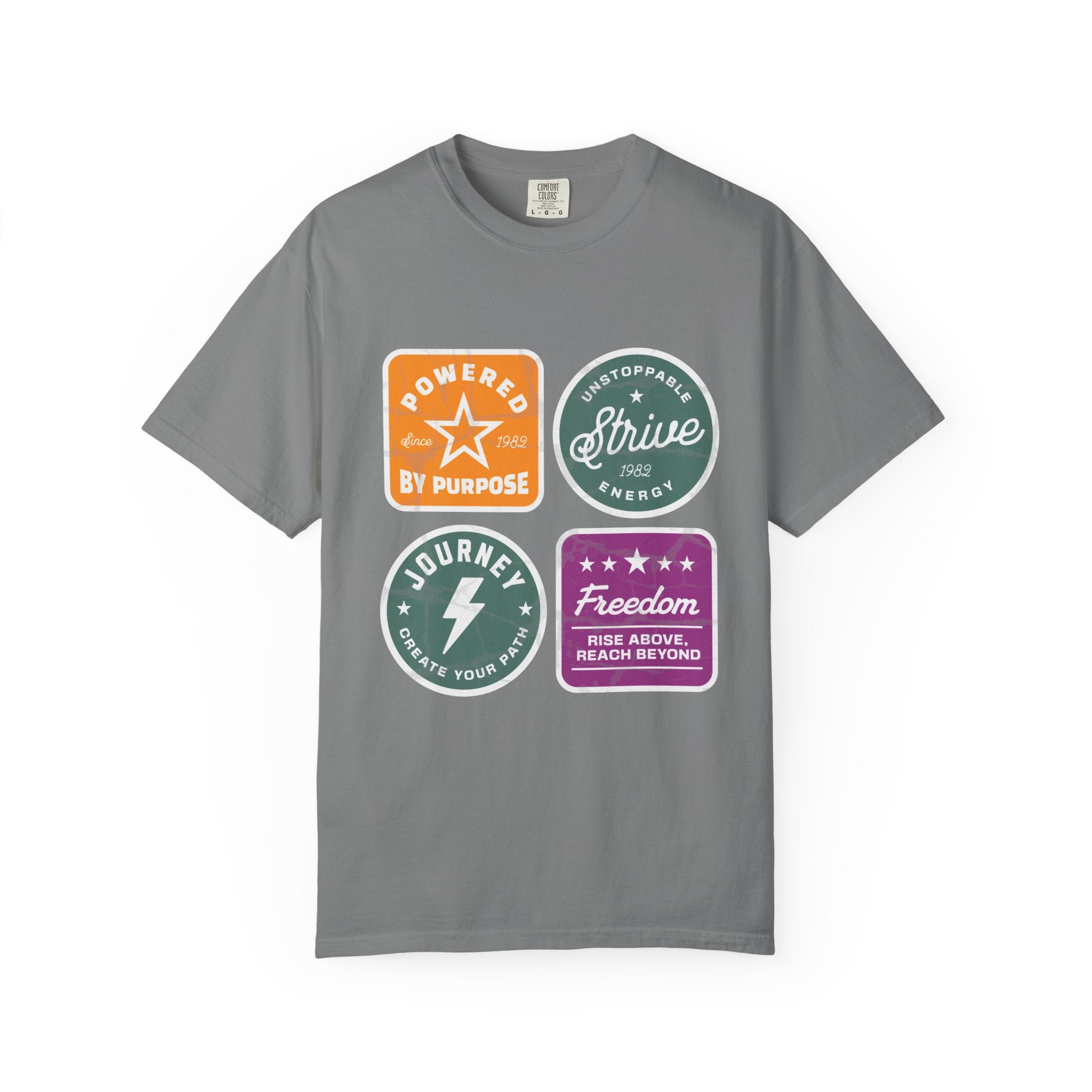 Motivational Badge T-Shirt — "Powered by Purpose / Strive / Journey / Freedom"