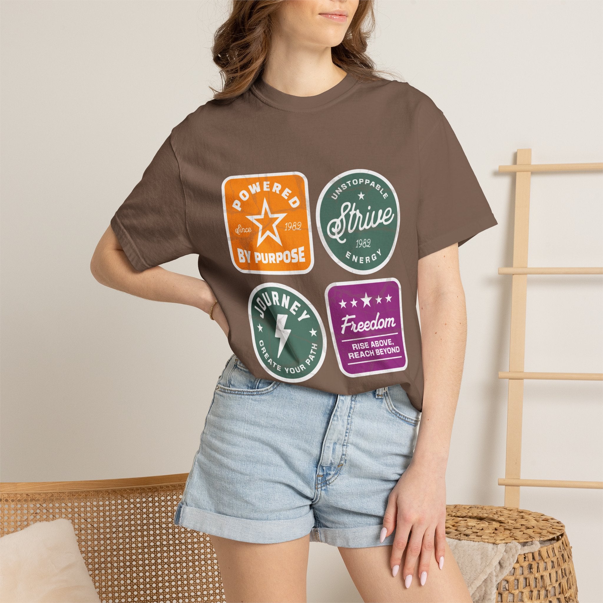 Motivational Badge T-Shirt — "Powered by Purpose / Strive / Journey / Freedom"