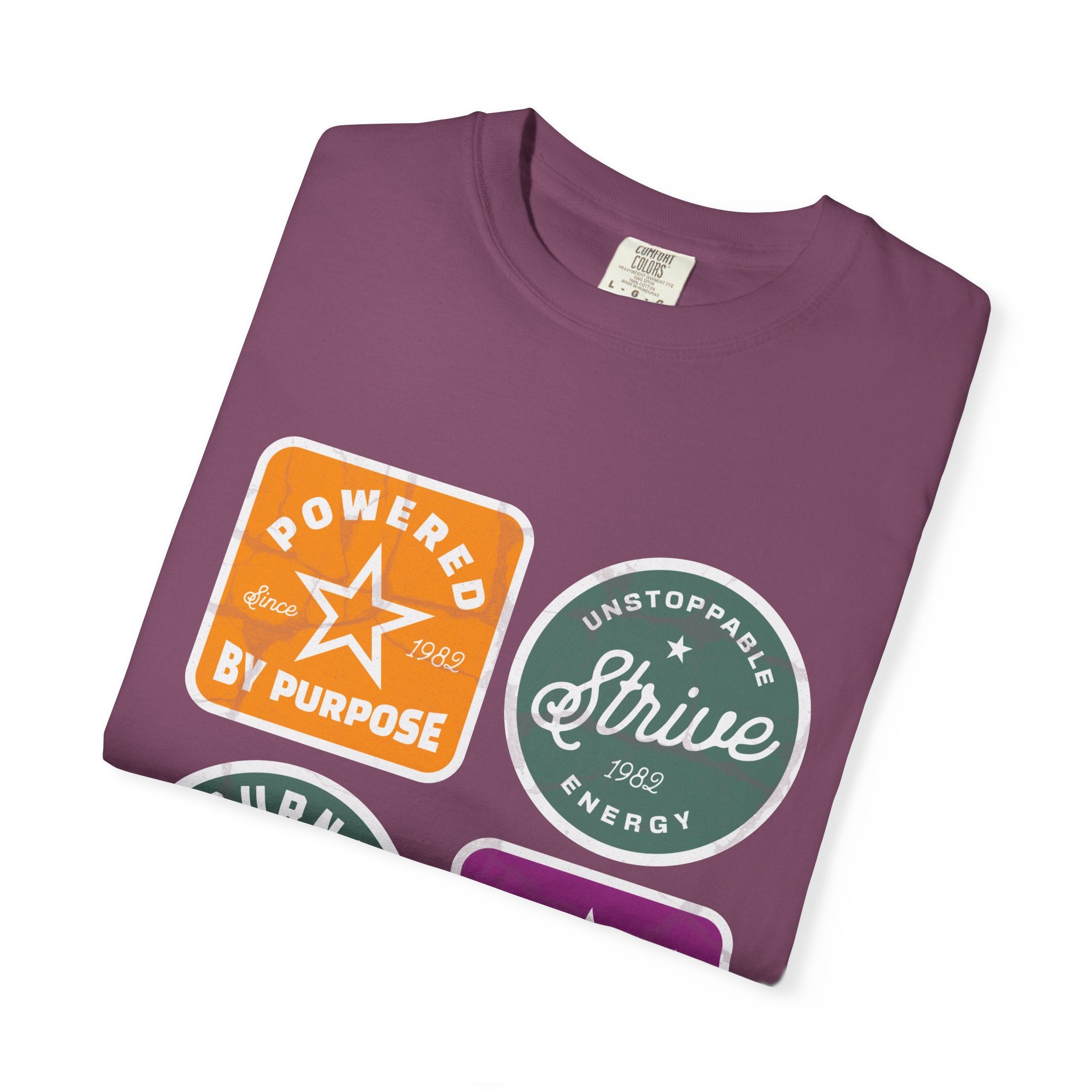 Motivational Badge T-Shirt — "Powered by Purpose / Strive / Journey / Freedom"