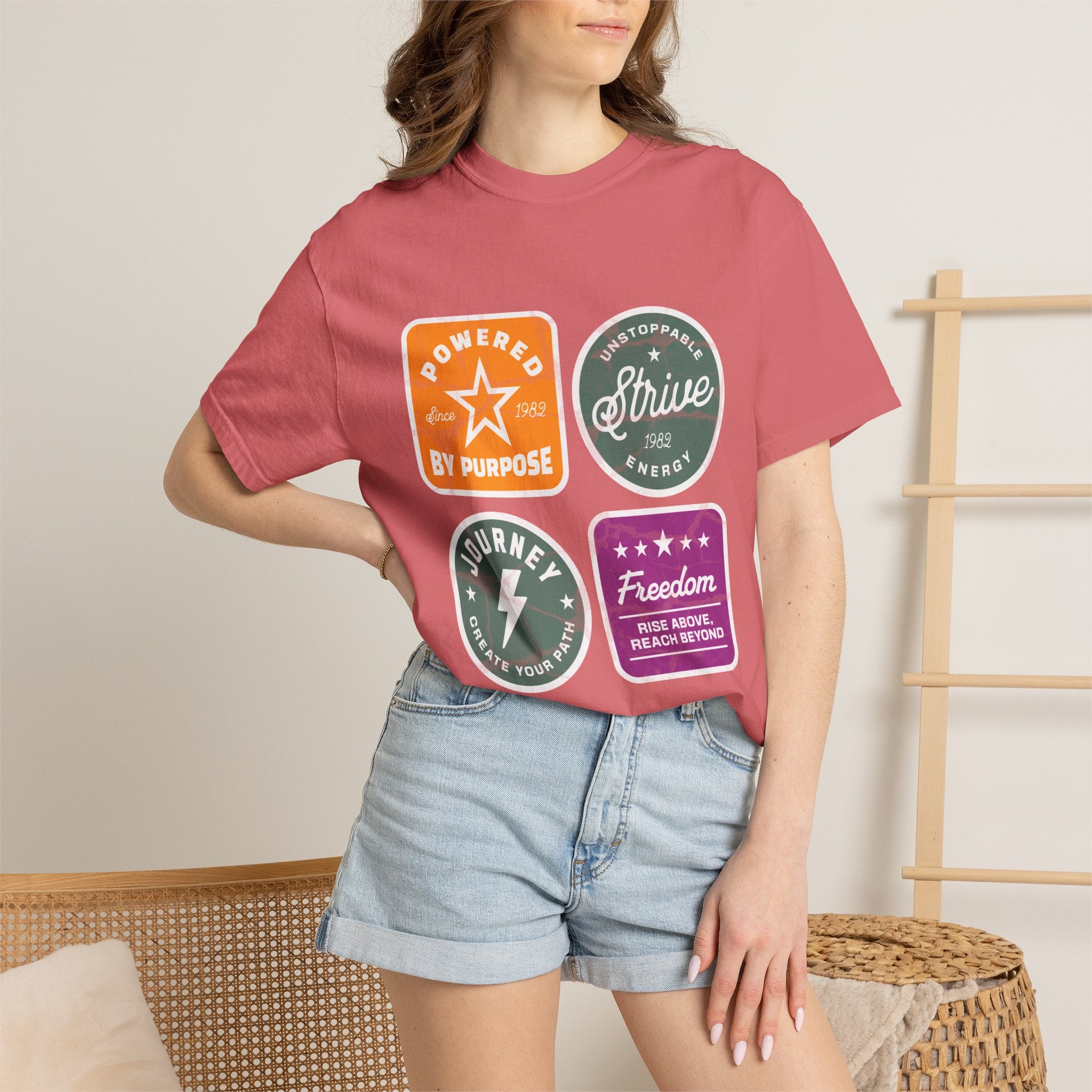 Motivational Badge T-Shirt — "Powered by Purpose / Strive / Journey / Freedom"