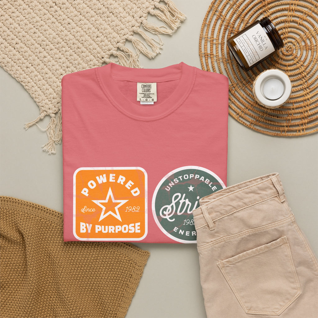 Motivational Badge T-Shirt — "Powered by Purpose / Strive / Journey / Freedom"