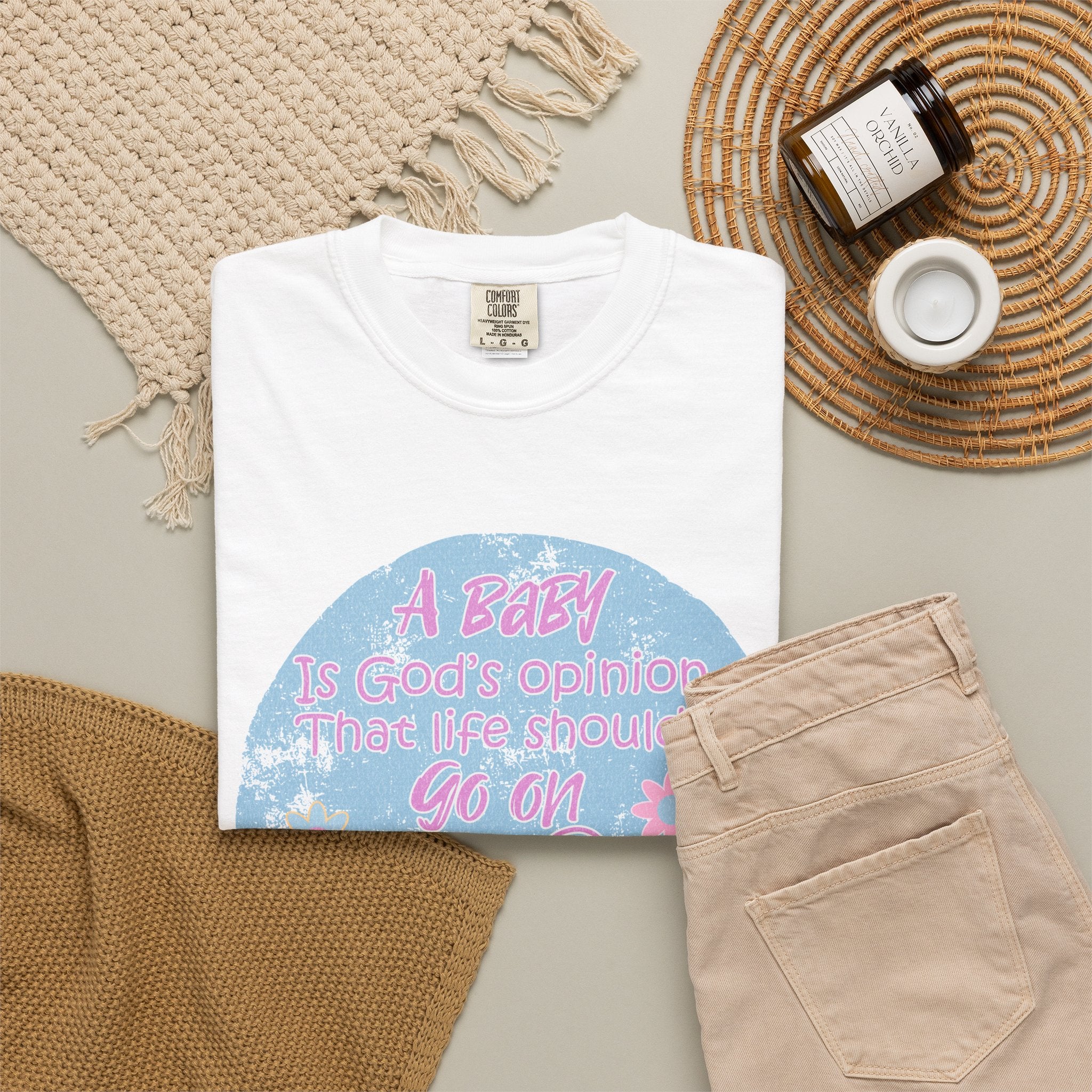 Textured T-Shirt — "A Baby is God’s Opinion That the World Should Go On" Pastel Floral Design